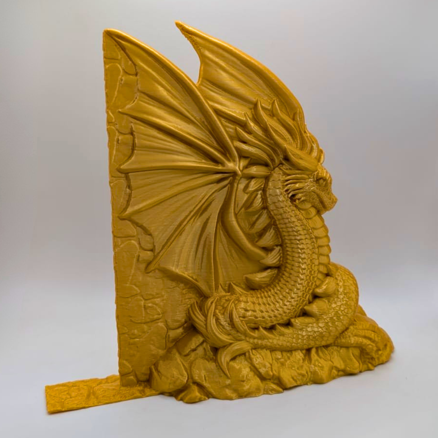 Sujeta libros dragones