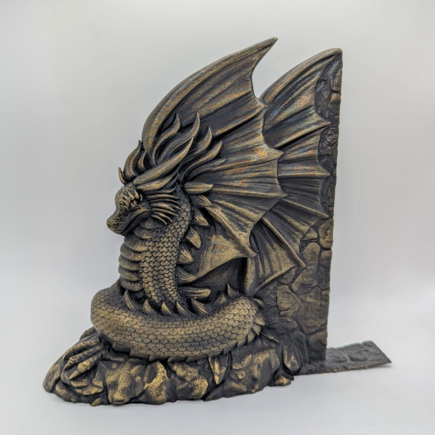 Sujeta libros dragones