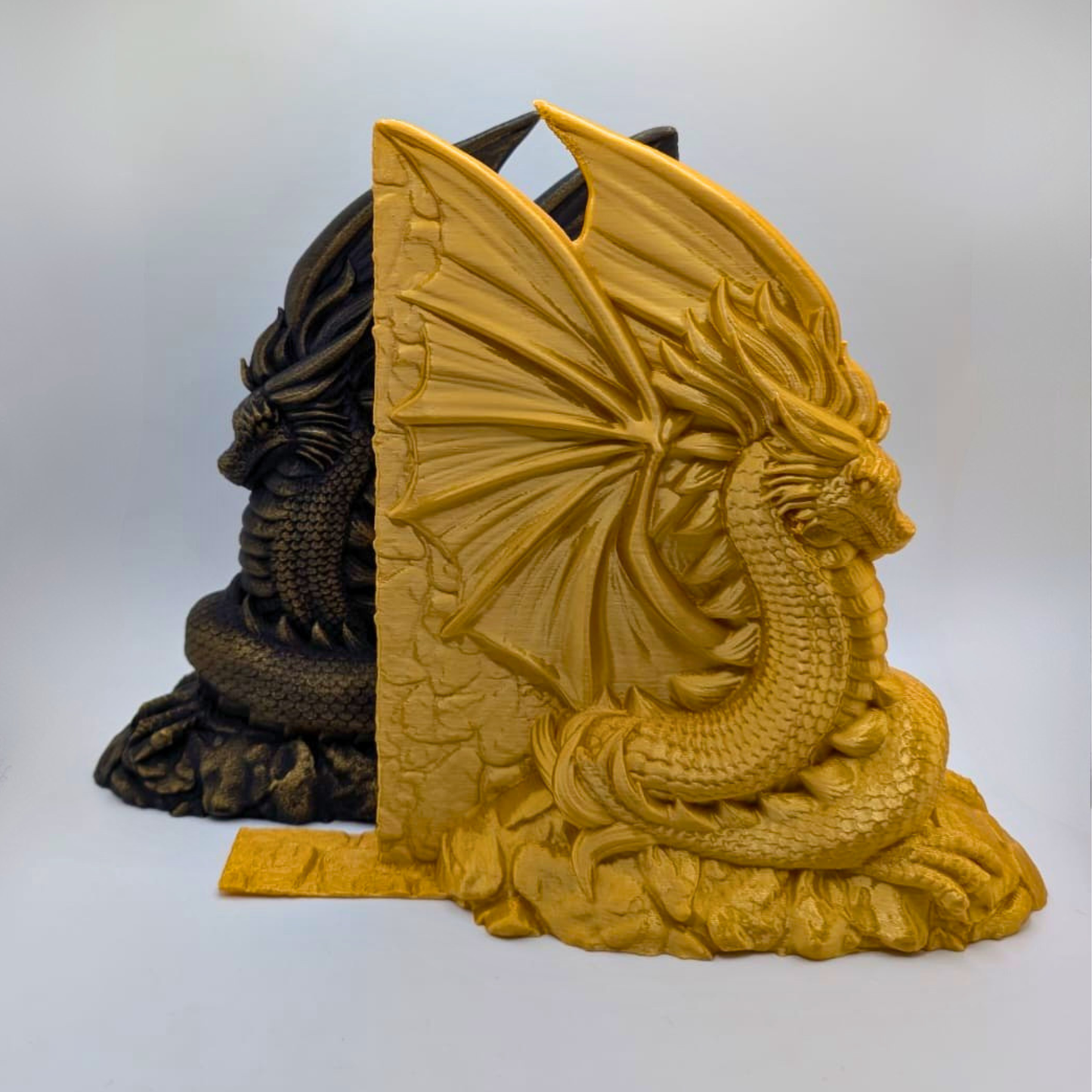 Sujeta libros dragones