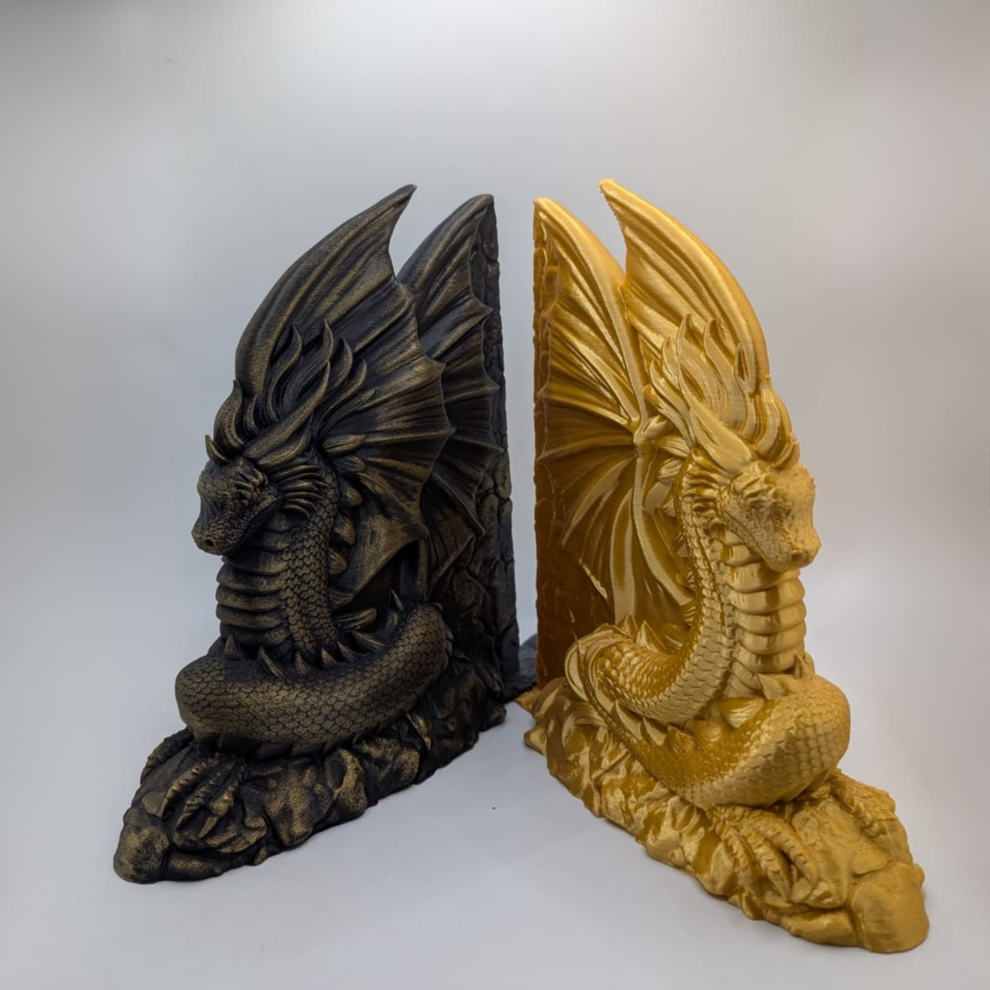 Sujeta libros dragones